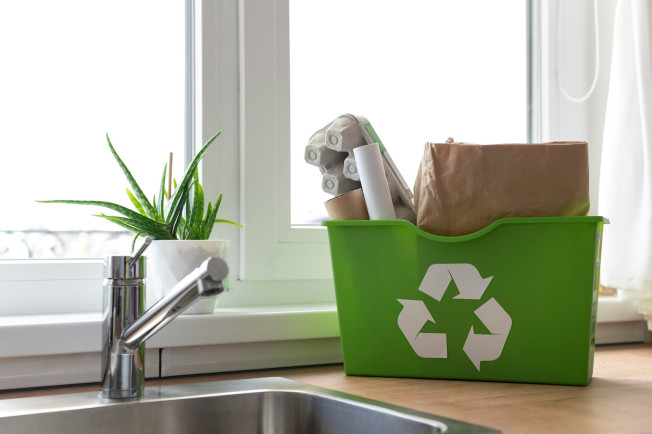 arrangement-with-recycle-bin-countertop_23-2148972913.jpg